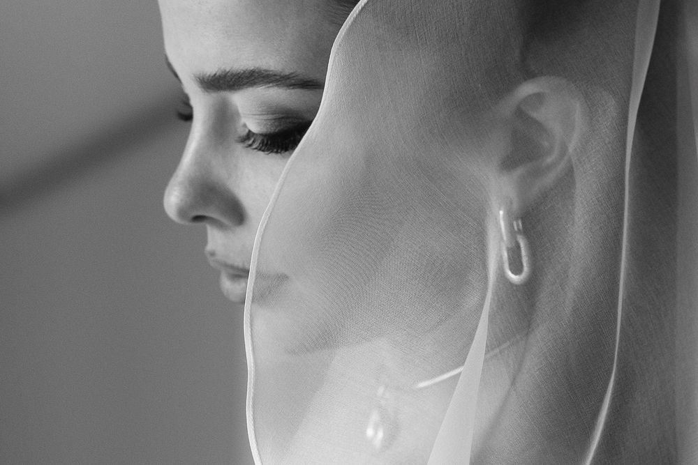 Close-up black and white profile portraits showing dramatic shadows and lighting effects.