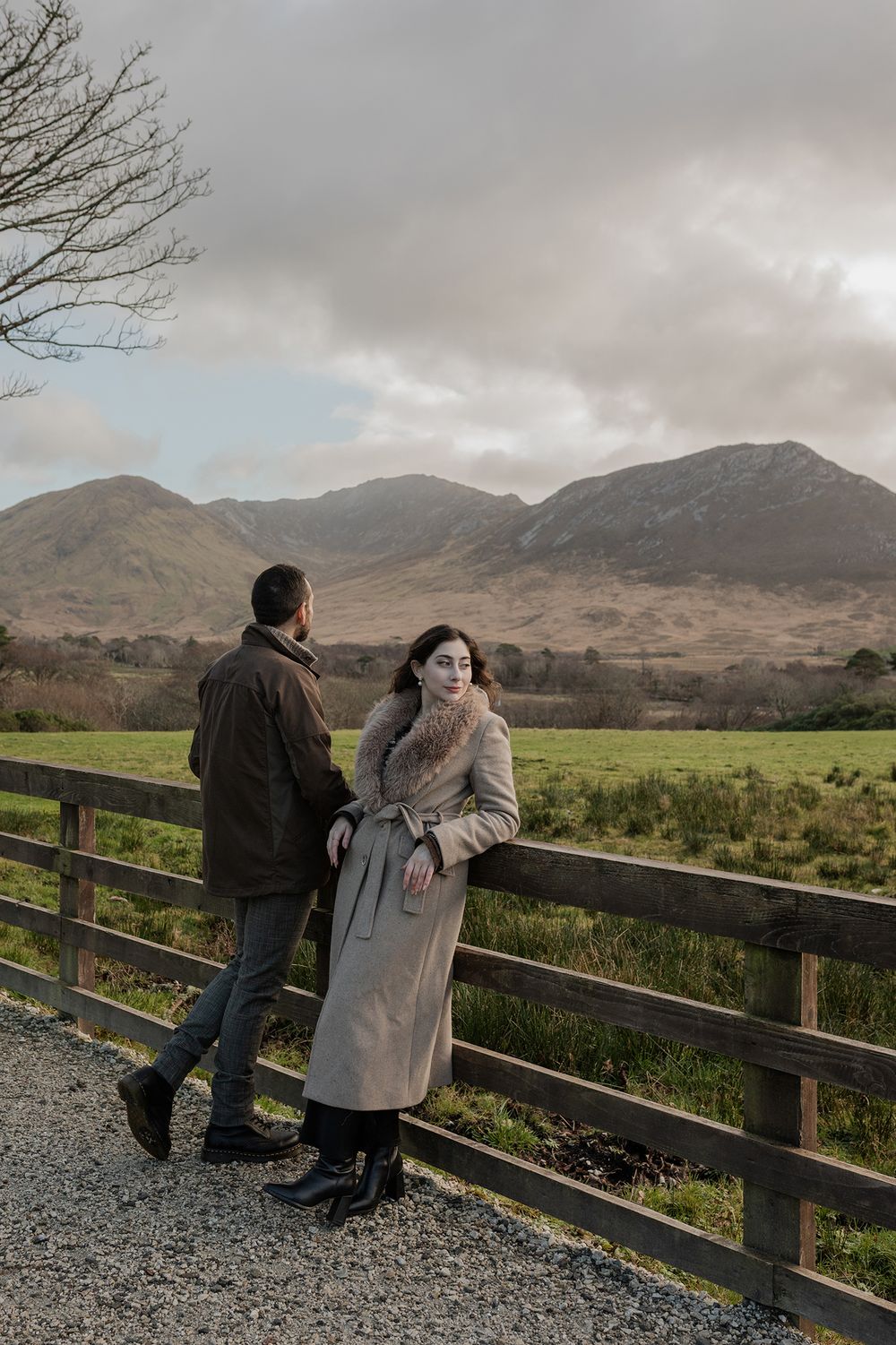 Romantic couple walking through Victorian Walled Gardens in Connemara