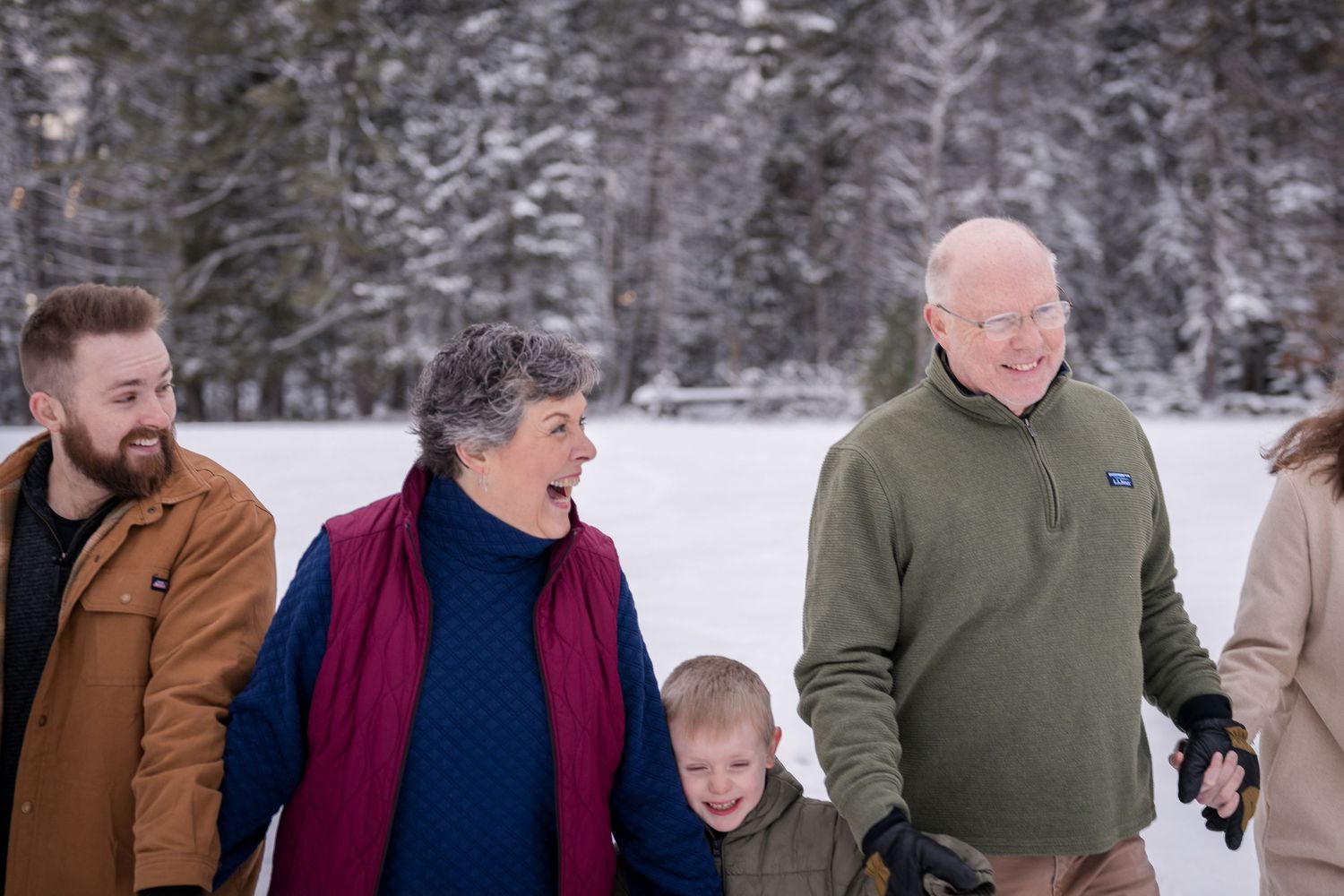 Sequence of casual family portraits showing genuine interactions in a snowy forest setting.