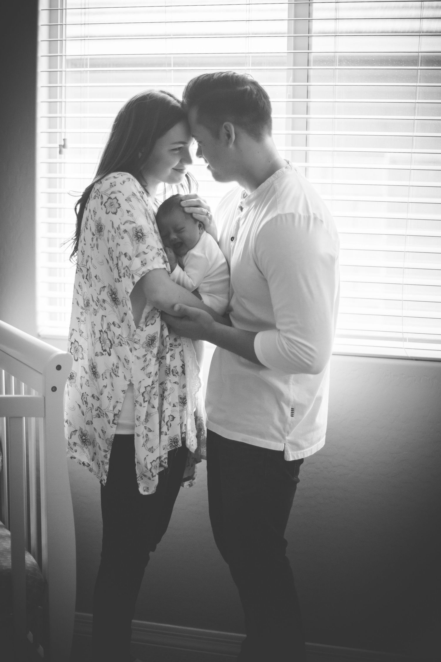 Peaceful newborn portrait wrapped in neutral tones Arizona photographer
