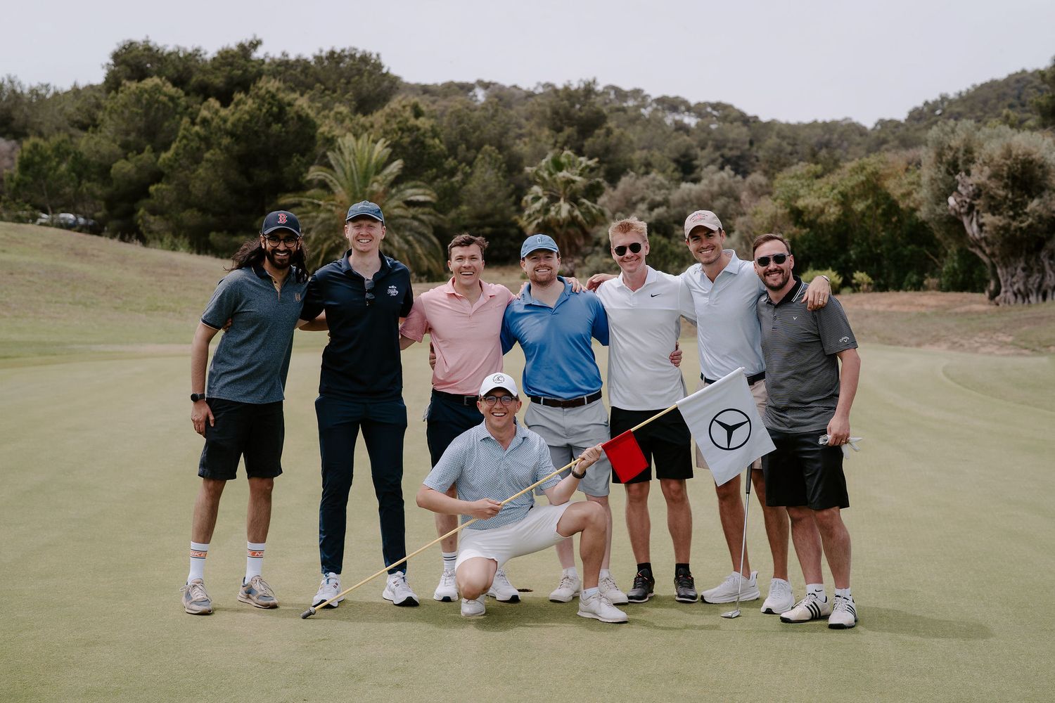 groom and groomsmen playing golf at golf ibiza