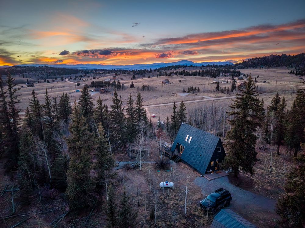 Sunset drone photo of the AFramed View AirBnb property by Denver Hospitality, Travel & Tourism photographer Captain Colorado Photography.
