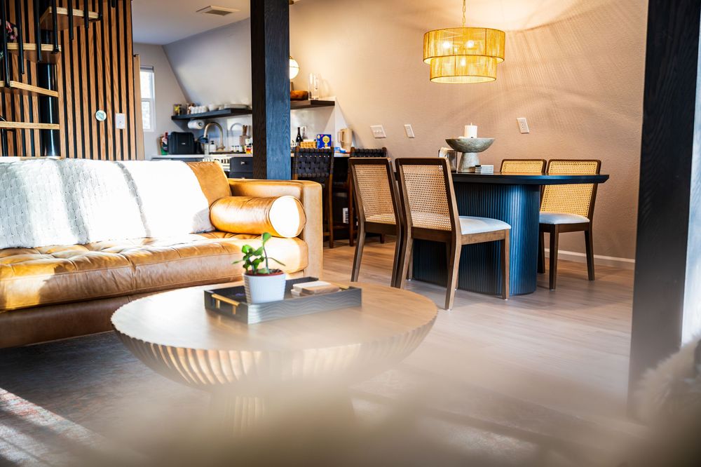 Elegant living room and dining area by Denver Hospitality, Travel & Tourism photographer Captain Colorado Photography.