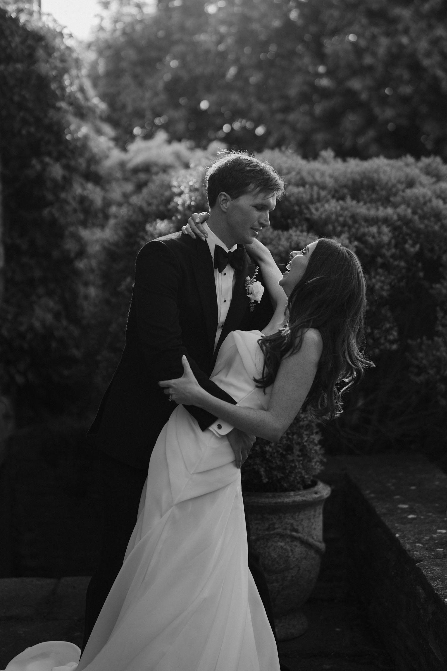 groom dipping laughing bride at dewsall court in herefordshire