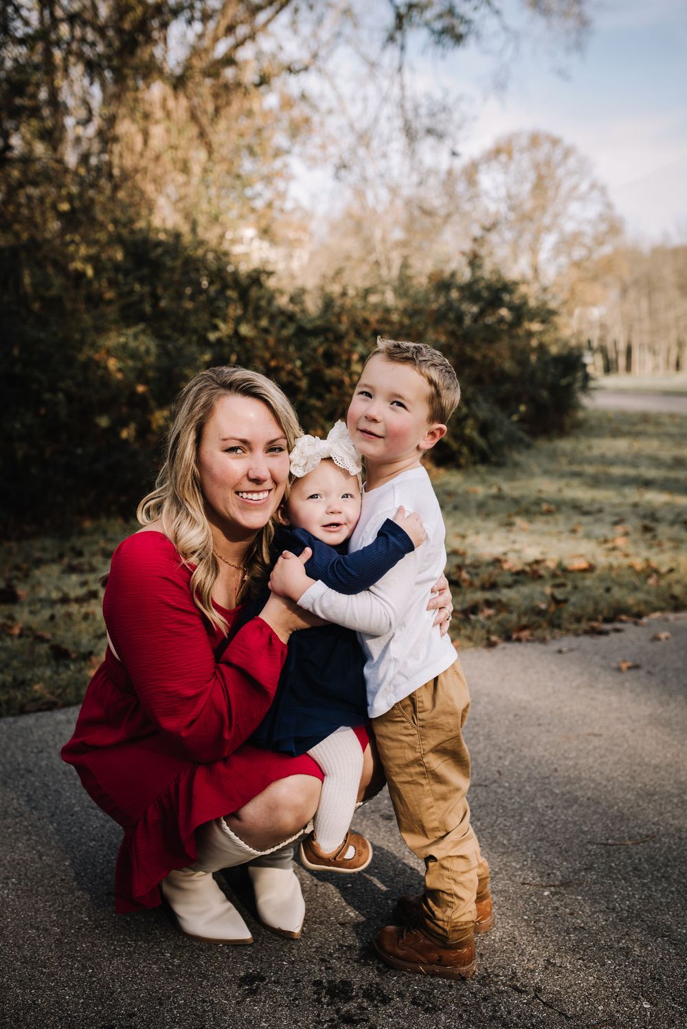 A series of candid outdoor family photos showing tender moments between a mother and child on a fall day.