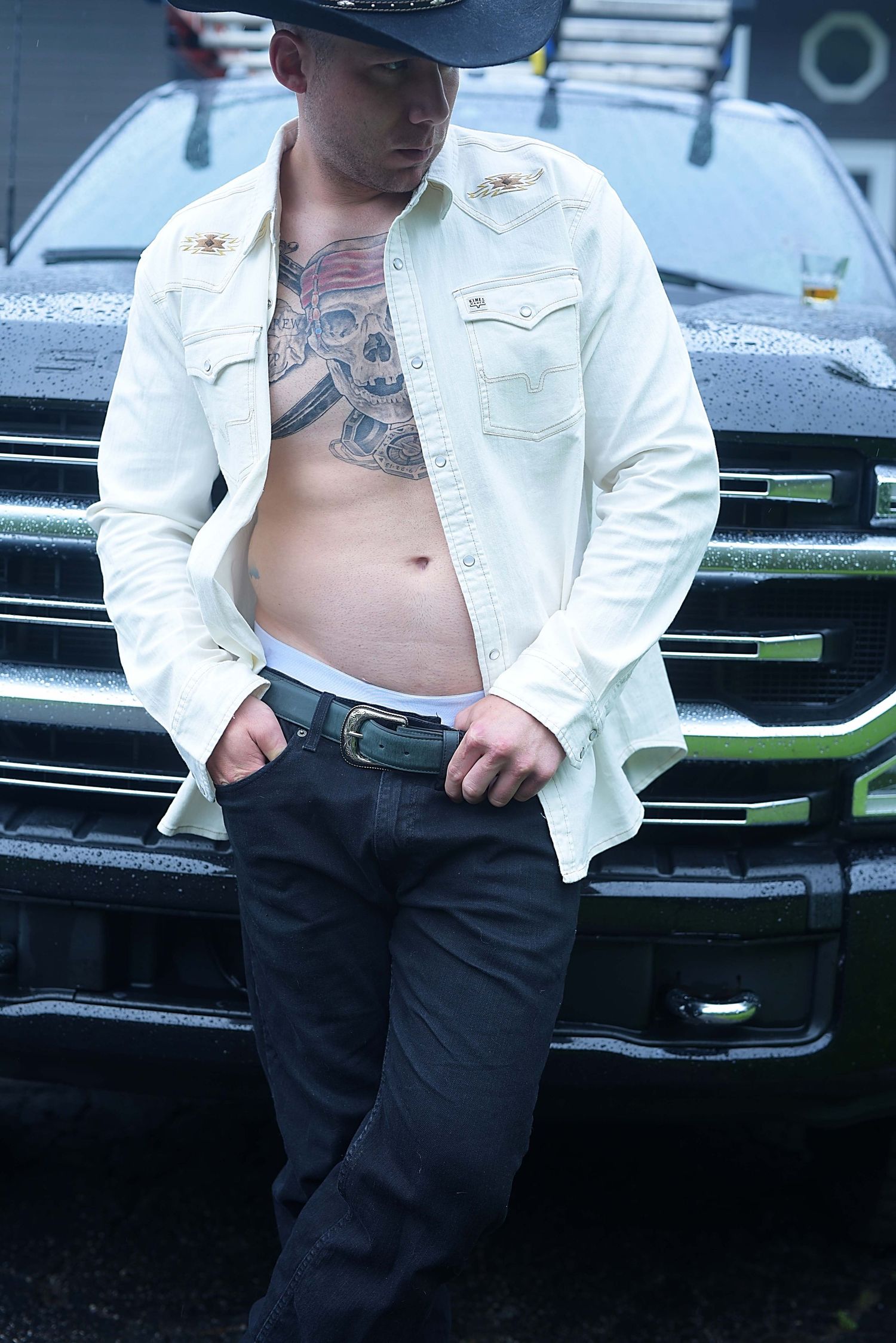 men's boudoir photographer ohio men boudoir cowboy tattoo firefighter truck man photoshoot men empowerment