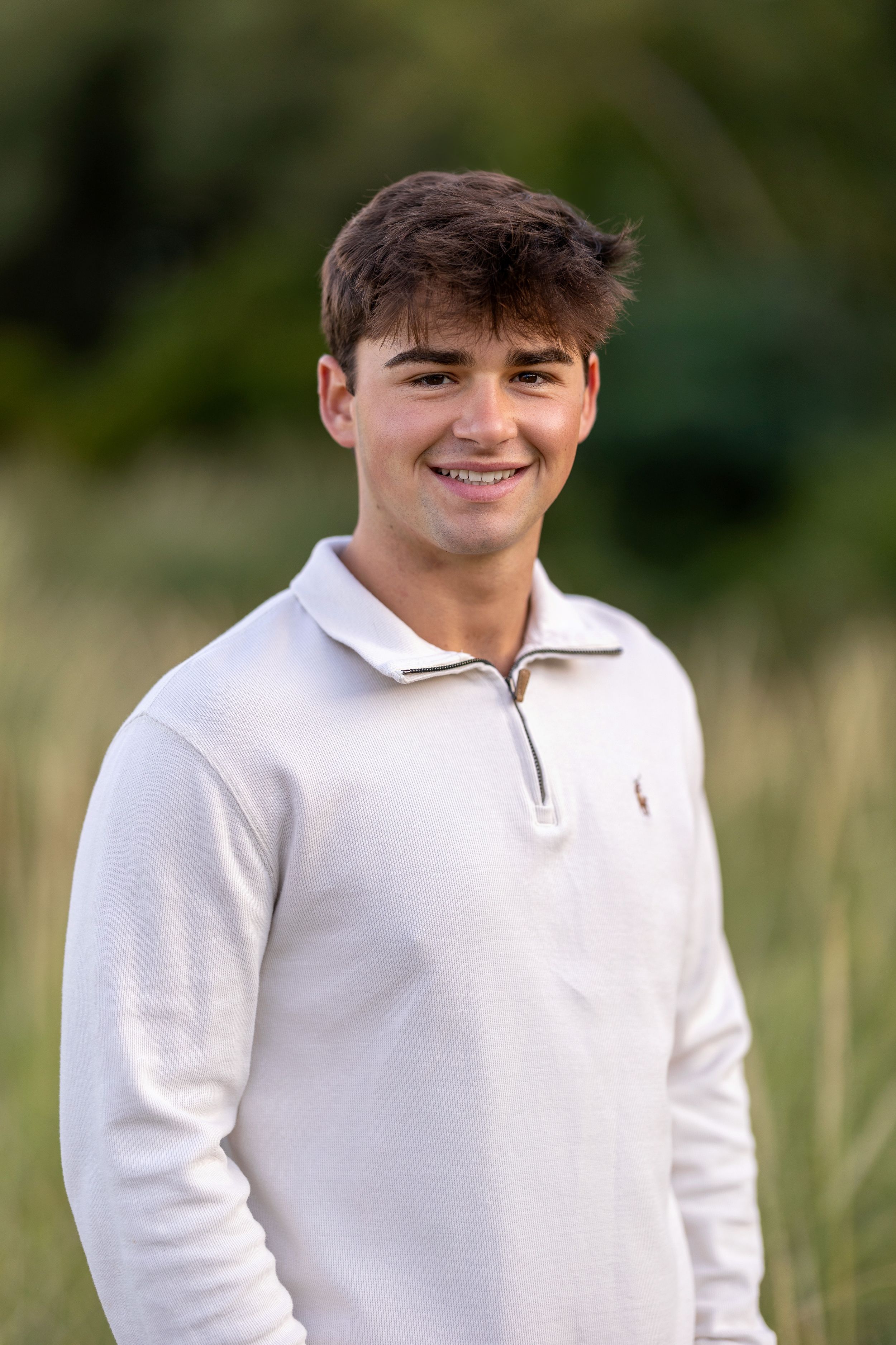 High school senior portrait at sunset at New Castle, NH