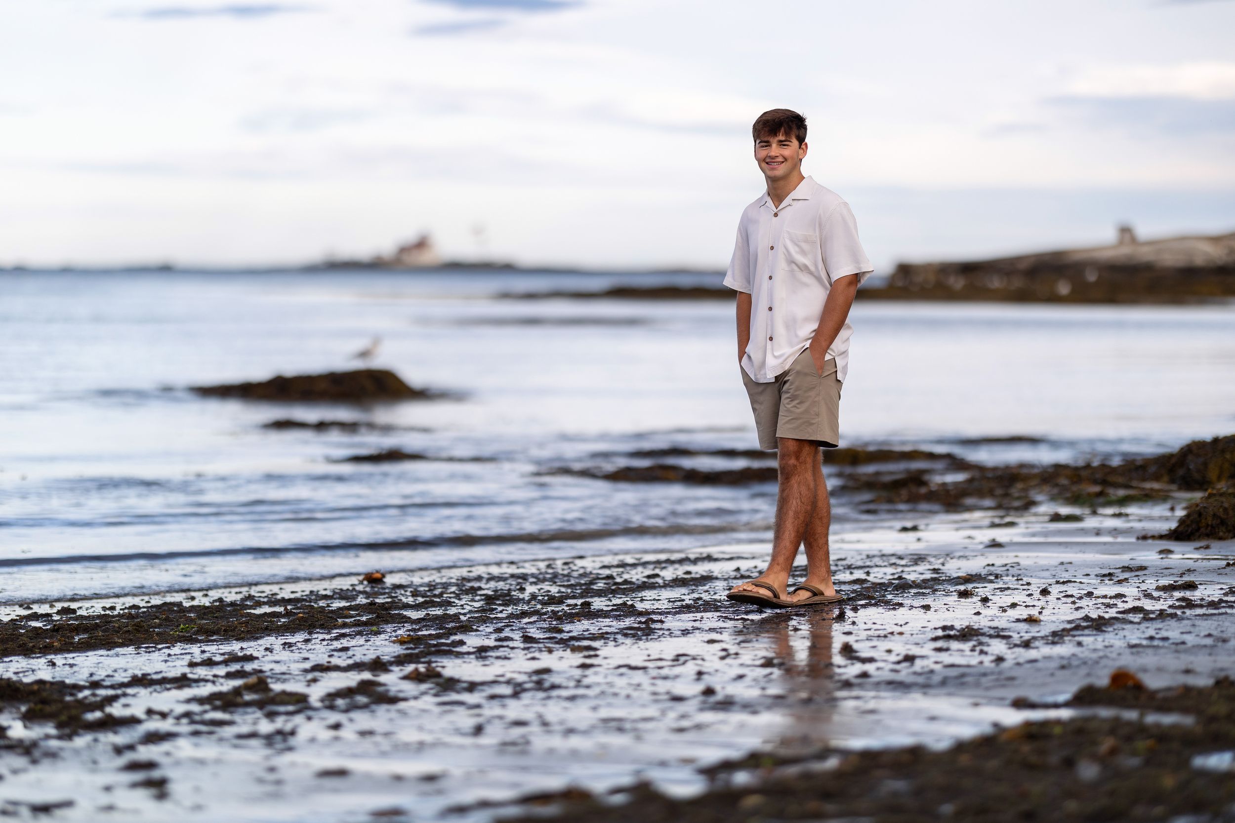 High school senior portrait at sunset at New Castle, NH