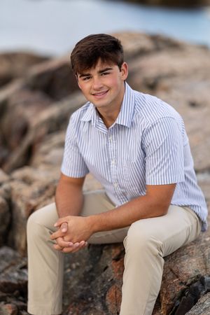 High school senior portrait at sunset at New Castle, NH