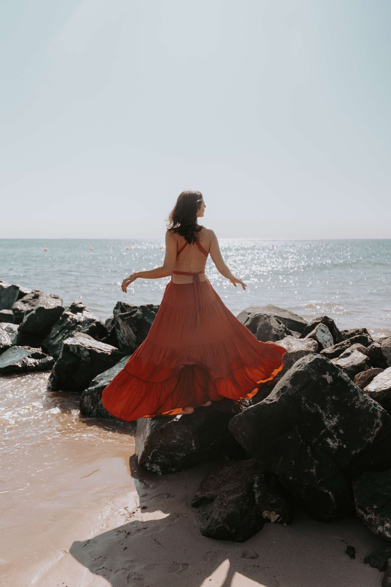 beach photoshoot in abu dhabi clinet closet options red dress