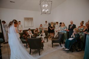 Wedding reception venue with elegant lantern lighting and comfortable seating arrangements.