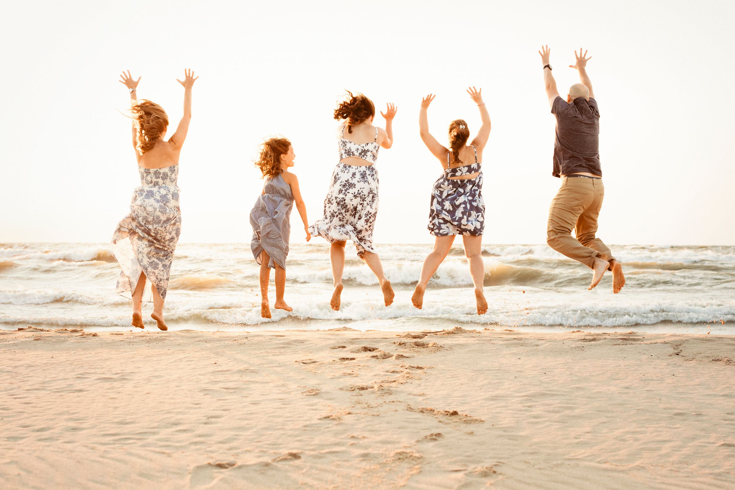 family of 5 with great outfits enjoying the lake michigan shoreline in benton harbor, mi