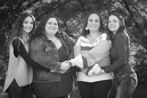 A collection of black and white candid group photos of people enjoying each other's company and embracing outdoors.