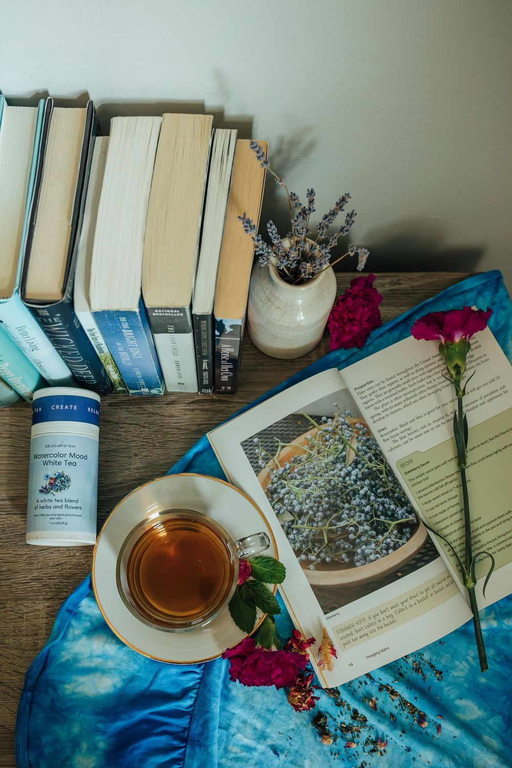 Flat lay of tea with blue tones and magenta pops, whimsical, branding photo, Whitney Popp photographer