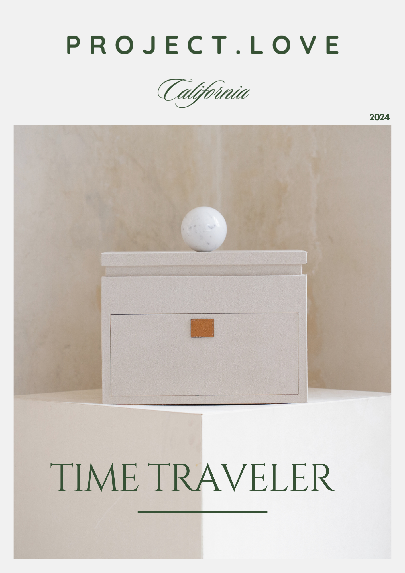 Minimalist product photo of Project Love California Time Traveler featuring a white box with beige background and decorative ball.