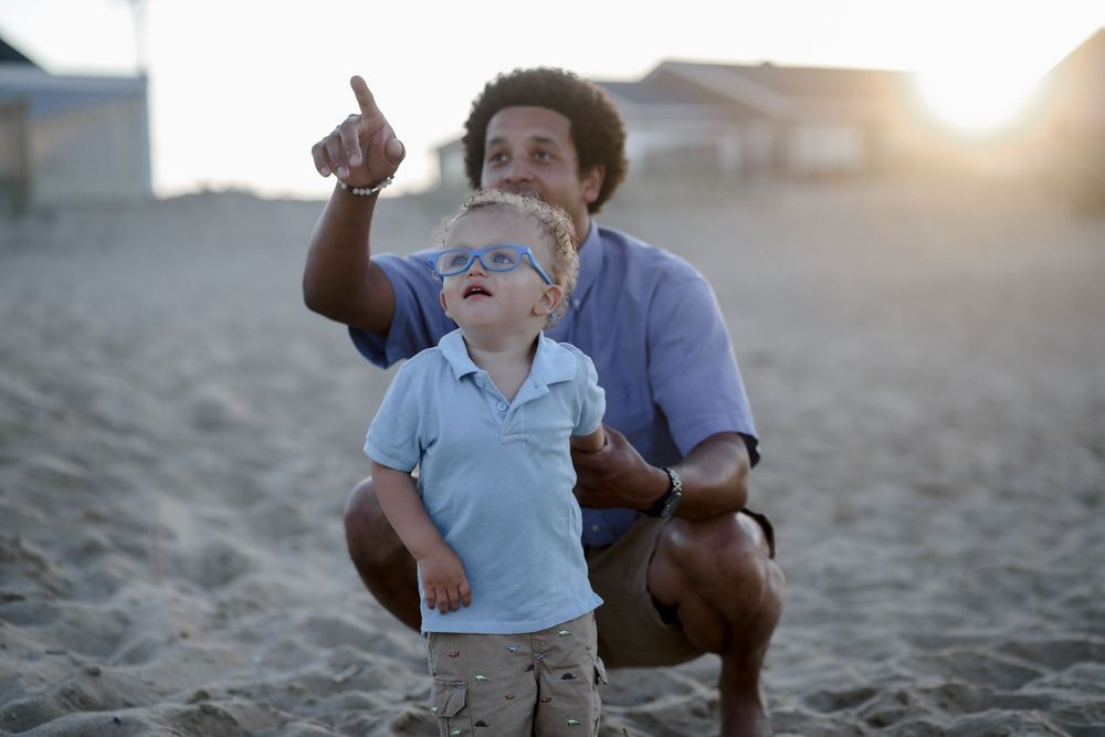 Father and son at the OBX. Beach day. North Carolina.