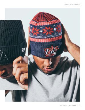 Male model wearing USA Baseball Vintage Cuff Knit beanie with snowflake pattern.