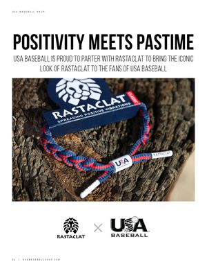 Rastaclat x USA Baseball braided rope bracelet in red, white, and navy on a wooden surface.