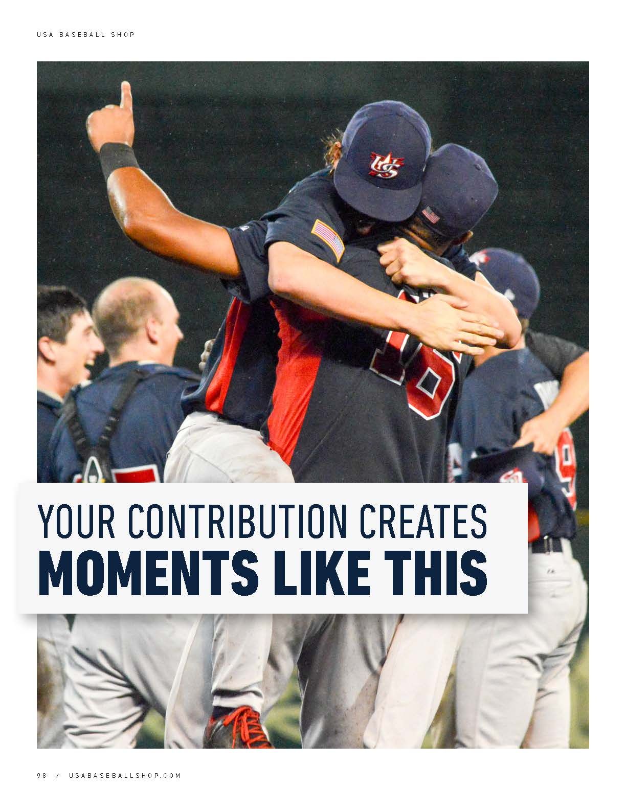 Two USA Baseball players celebrating with a hug during a game with teammates in the background.
