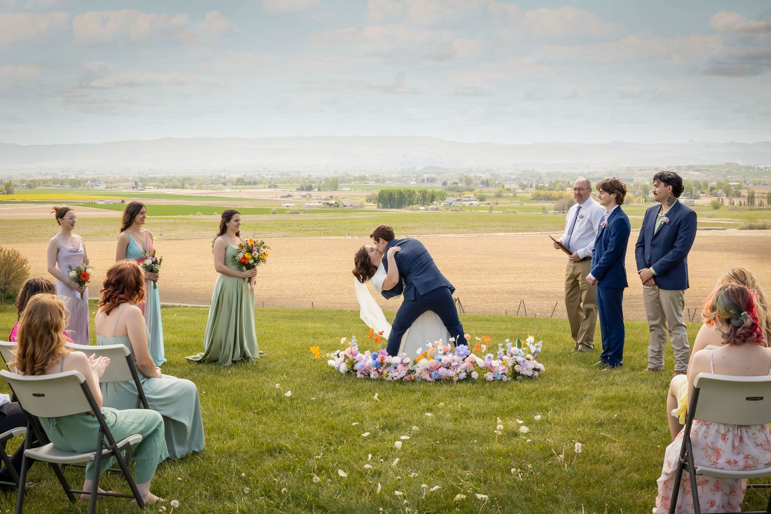 groom dipping bride