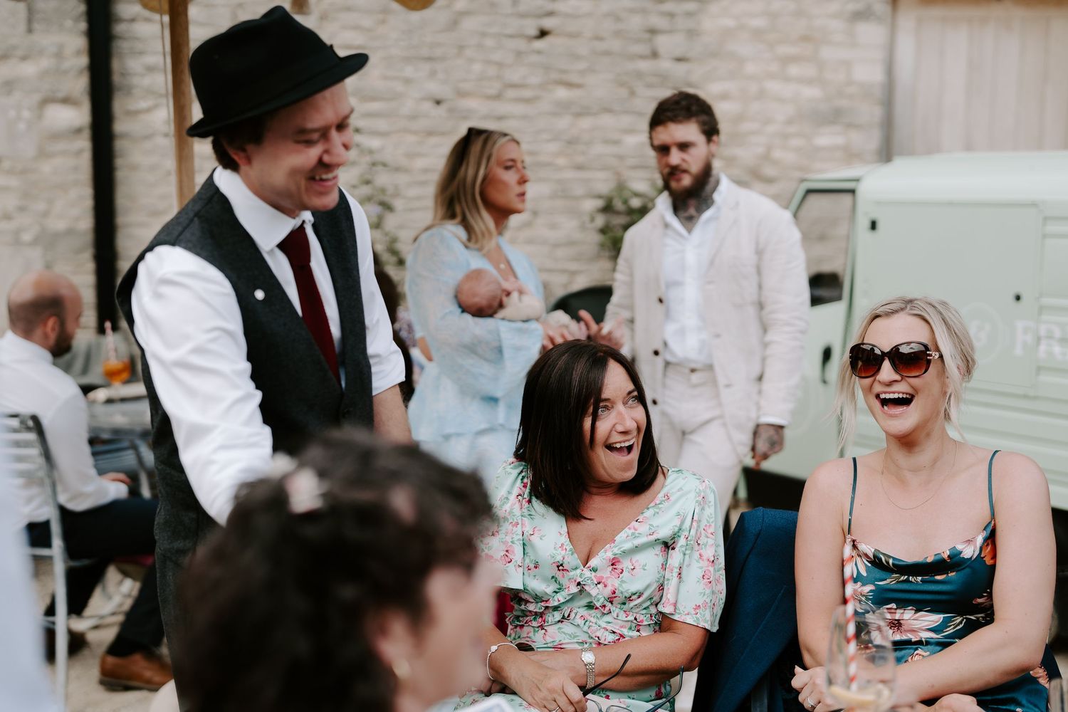 magician making wedding guests laugh at yardspace old gore in cirencester
