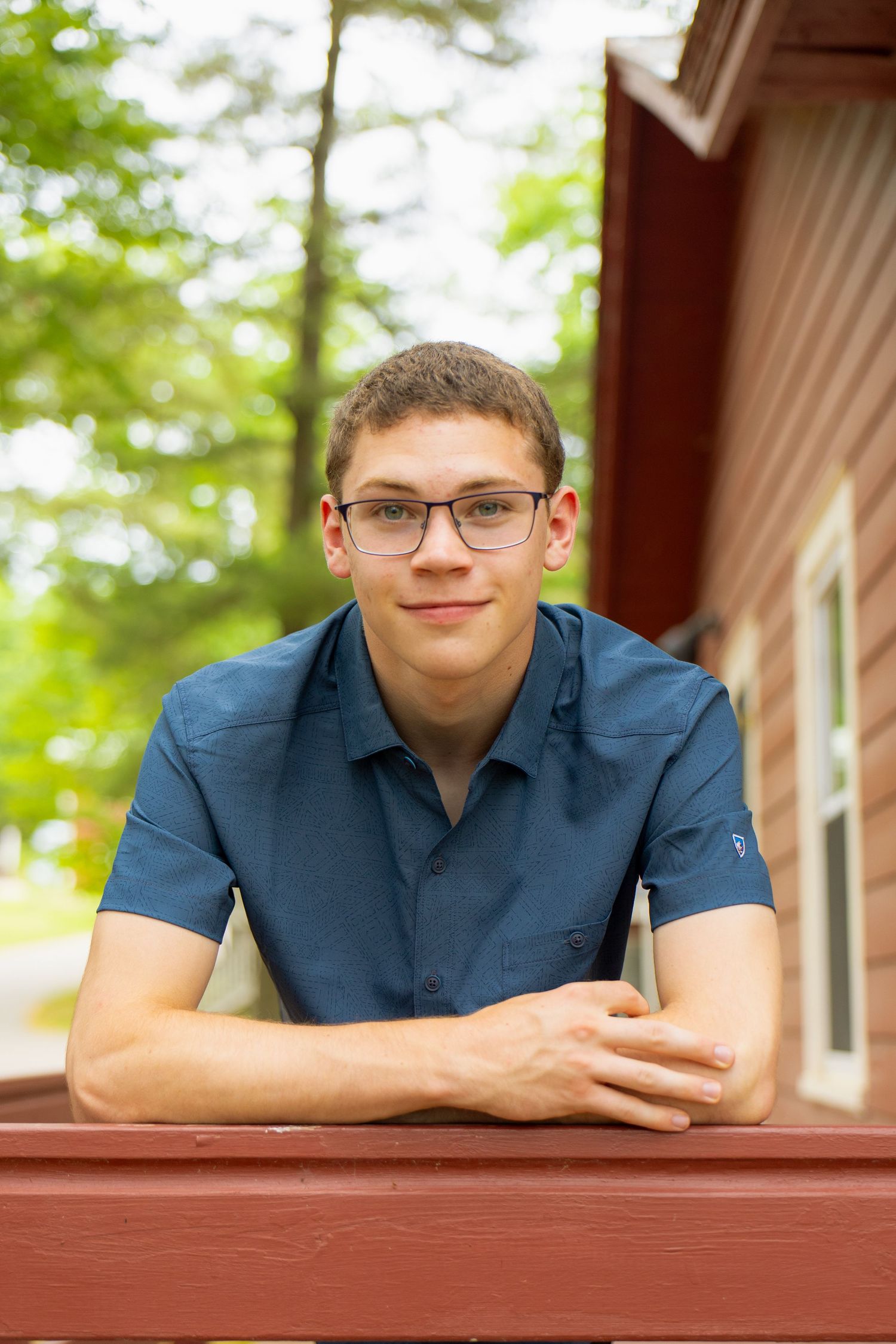 A headshot portrait of a senior boy