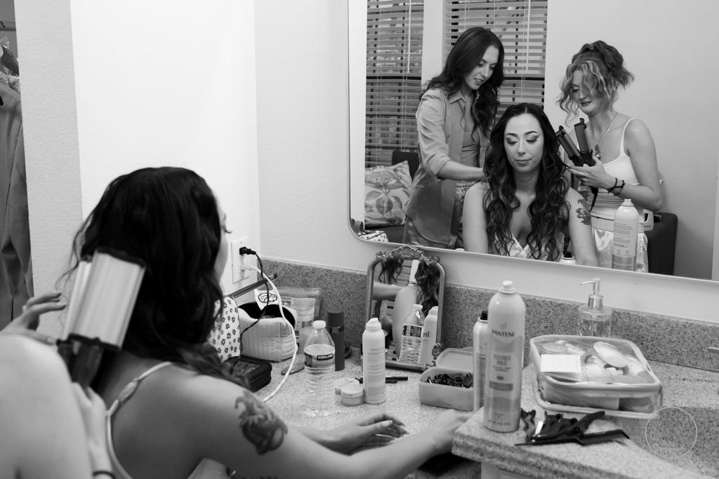 Wedding photo of woman getting ready prior to ceremony