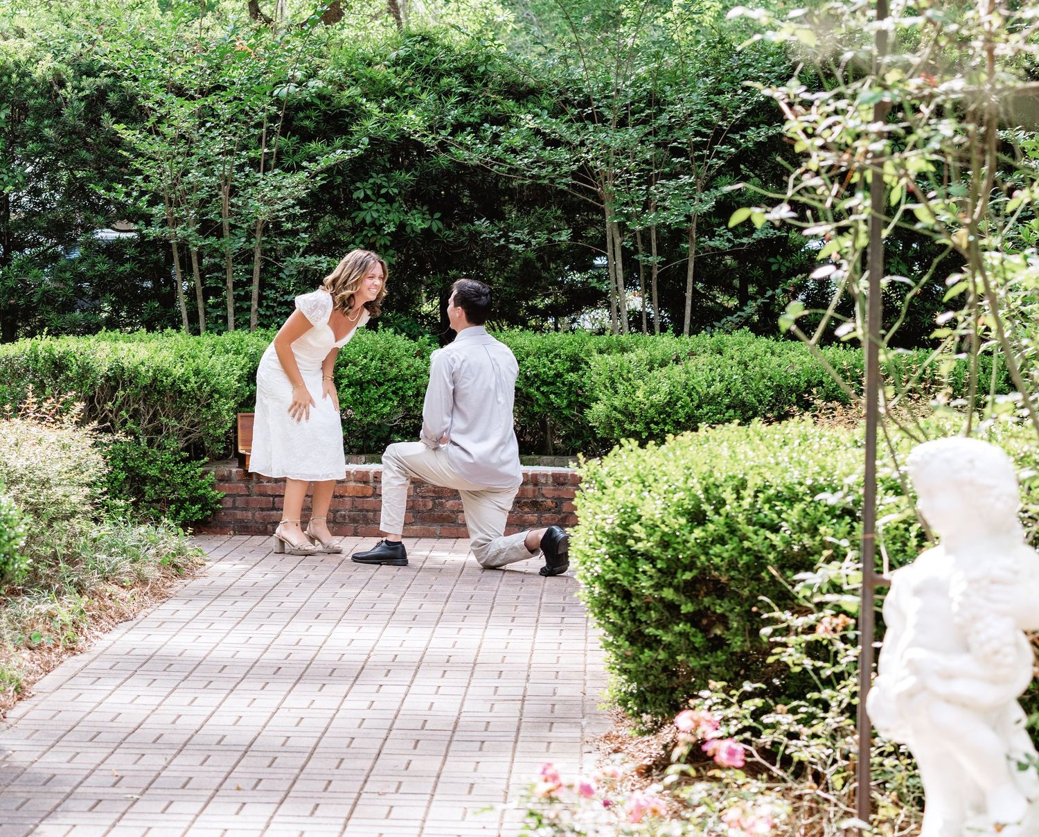 A set of five images showing an outdoor garden pathway with brick paving and lush green landscaping throughout.