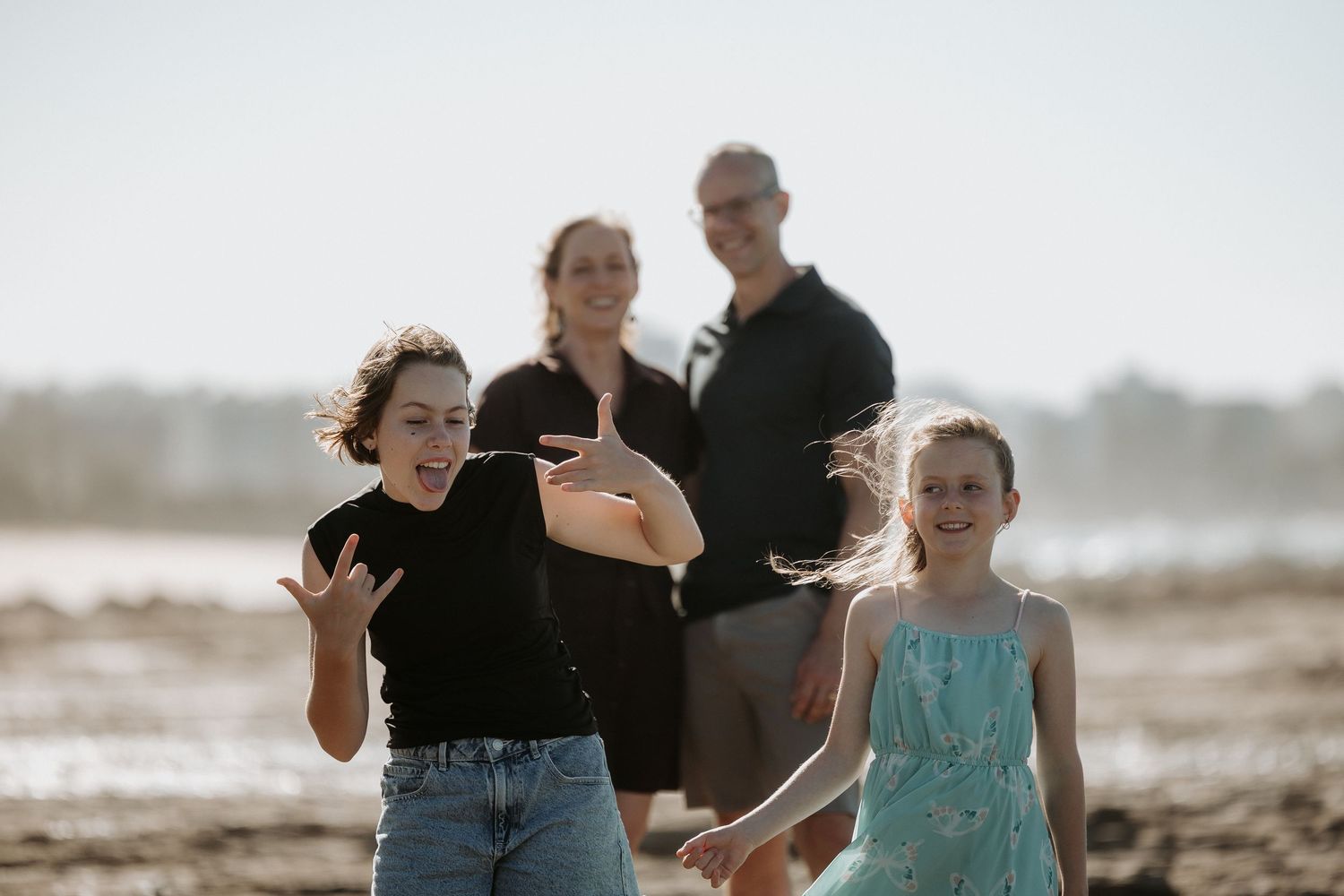 Sunset golden hour extended family photography session overlooking Point Cartwright Mooloolaba on the Sunshine Coast.