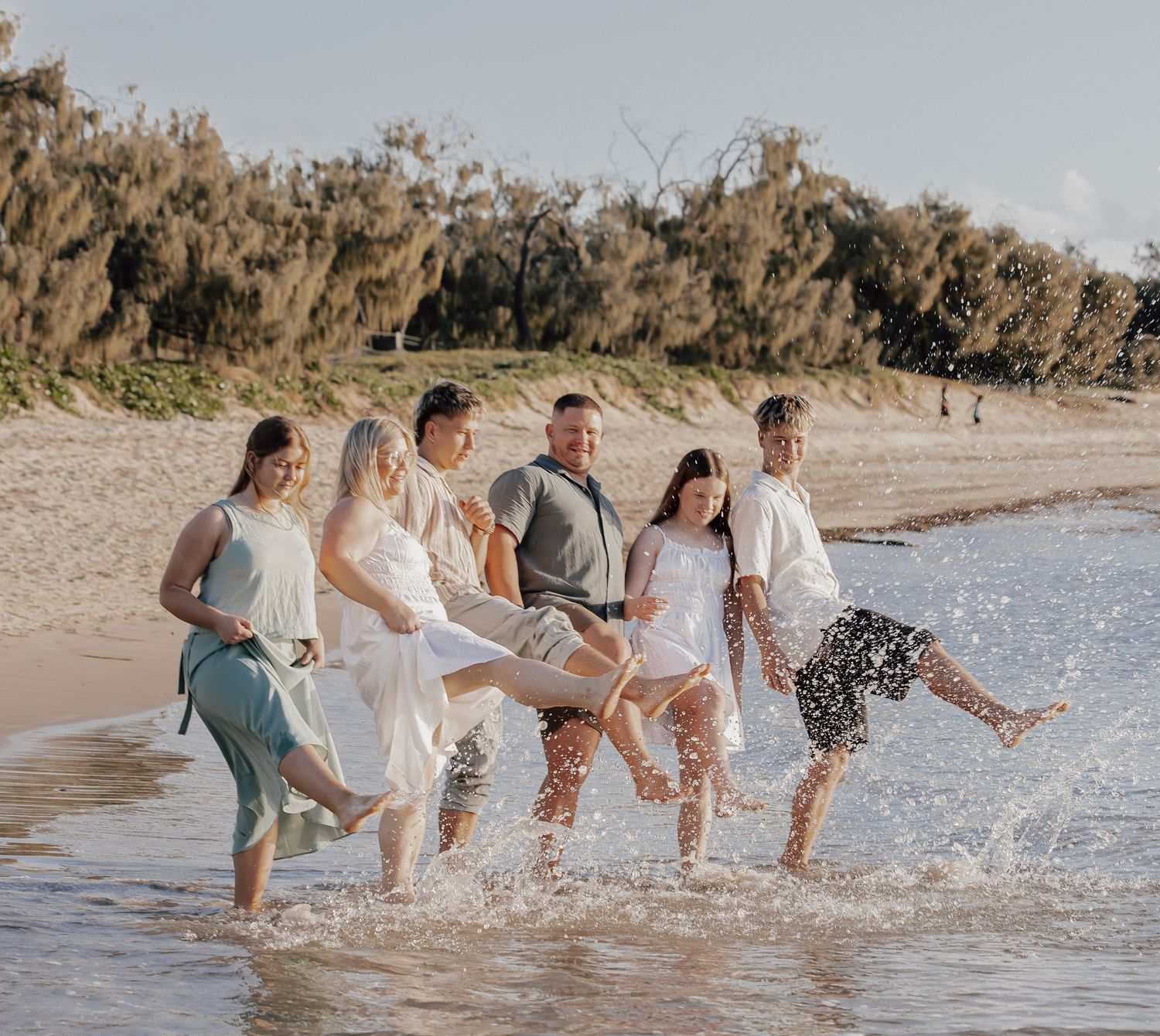 Sunset golden hour extended family photography session overlooking Point Cartwright Mooloolaba on the Sunshine Coast.