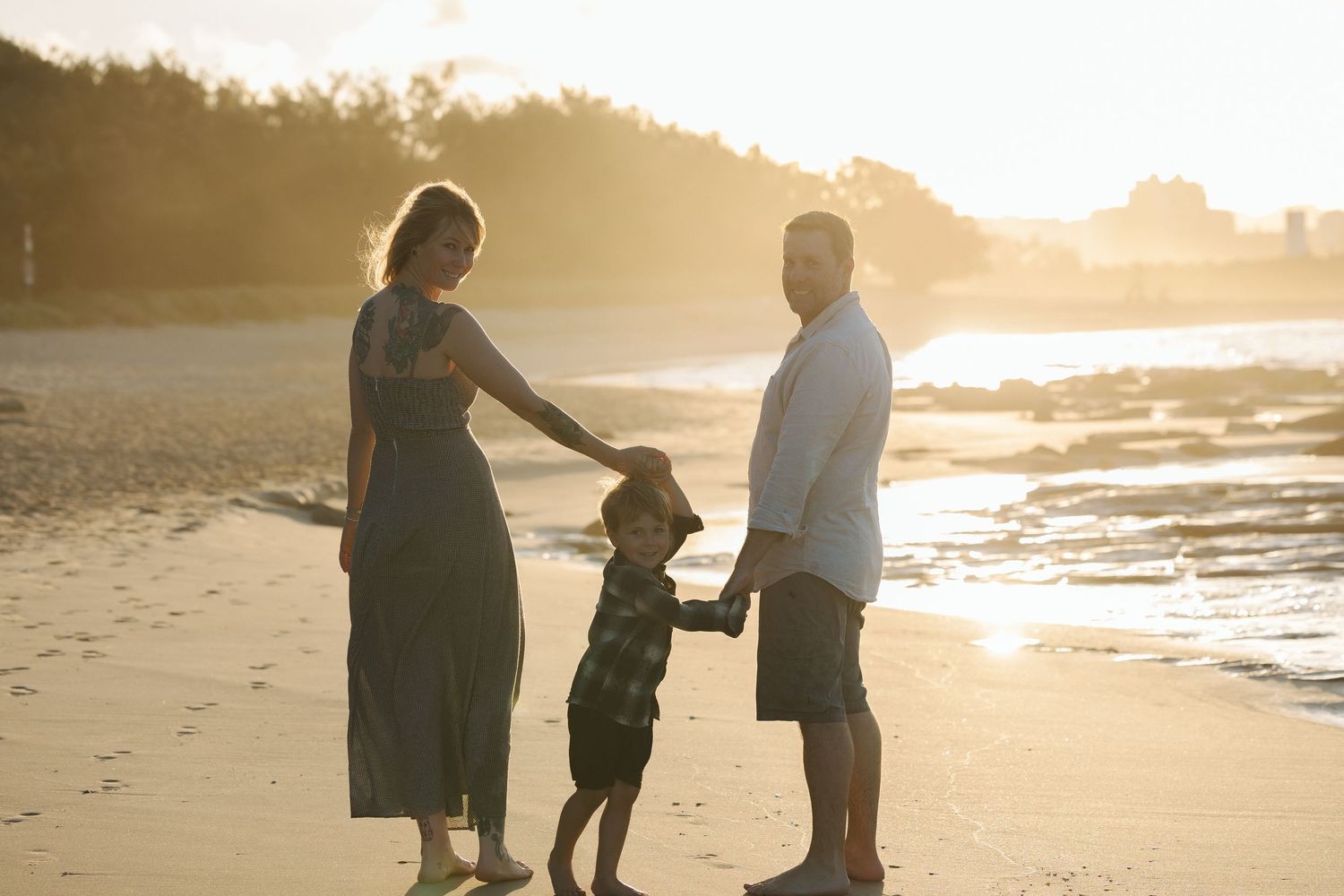Sunset golden hour family photography session overlooking Point Cartwright beach Mooloolaba on the Sunshine Coast.