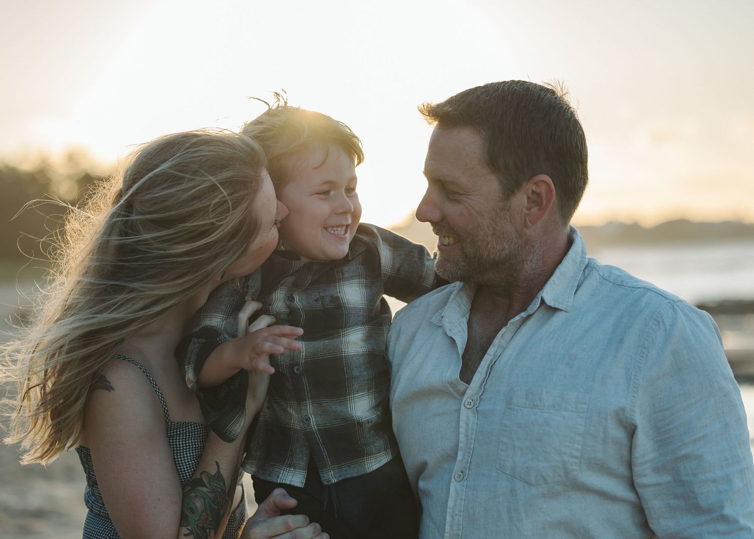 Sunset golden hour family photography session overlooking Point Cartwright beach Mooloolaba on the Sunshine Coast.