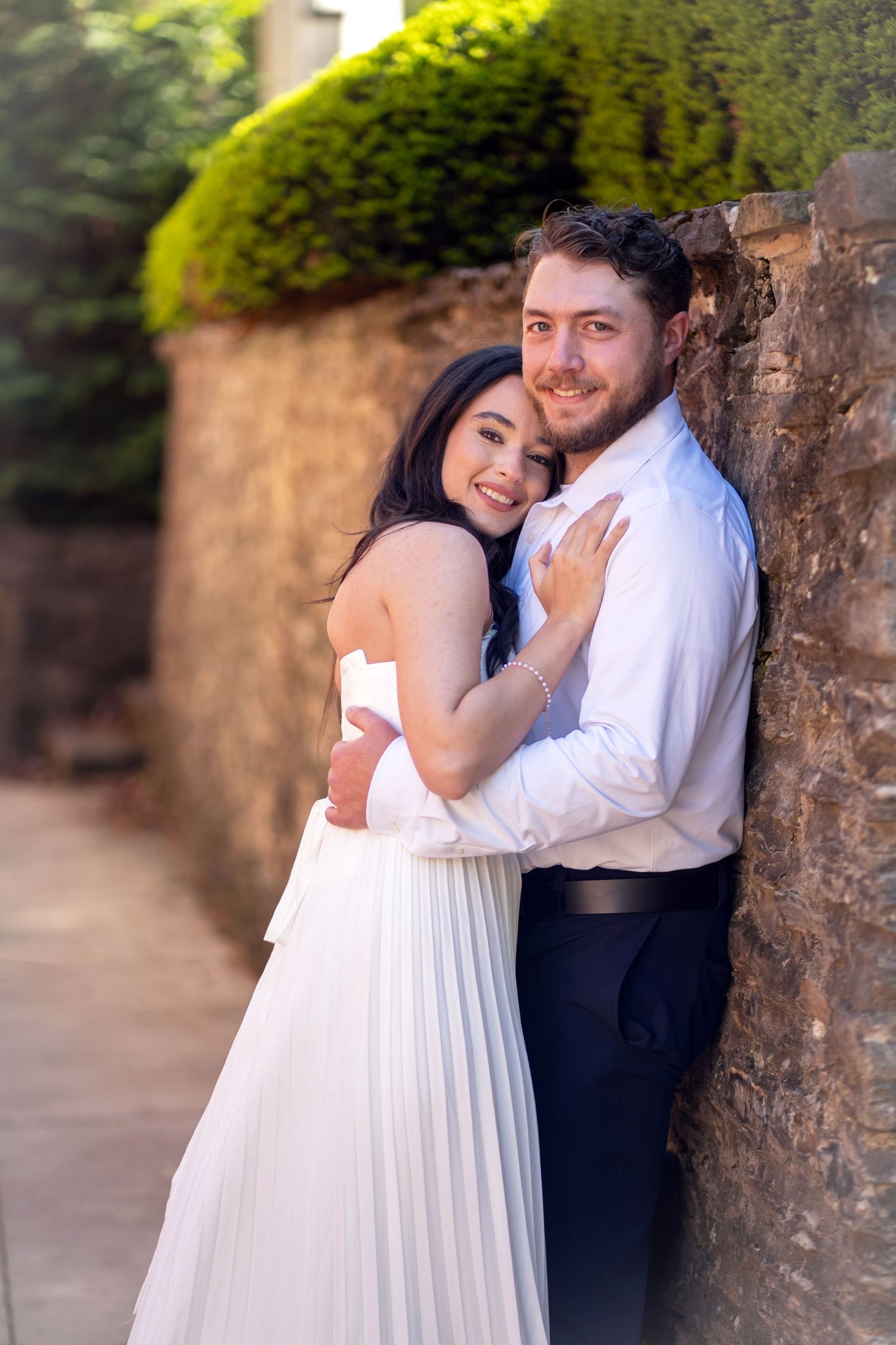 romantic couple pose for their engagement session photo