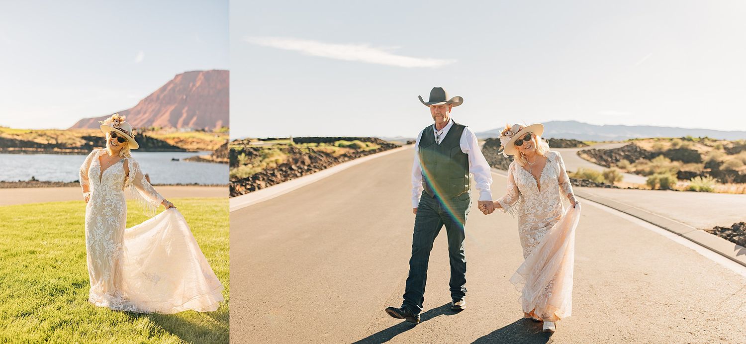 Bride and groom in western attire pose on a scenic road with mountain views on their rustic outdoor wedding day.