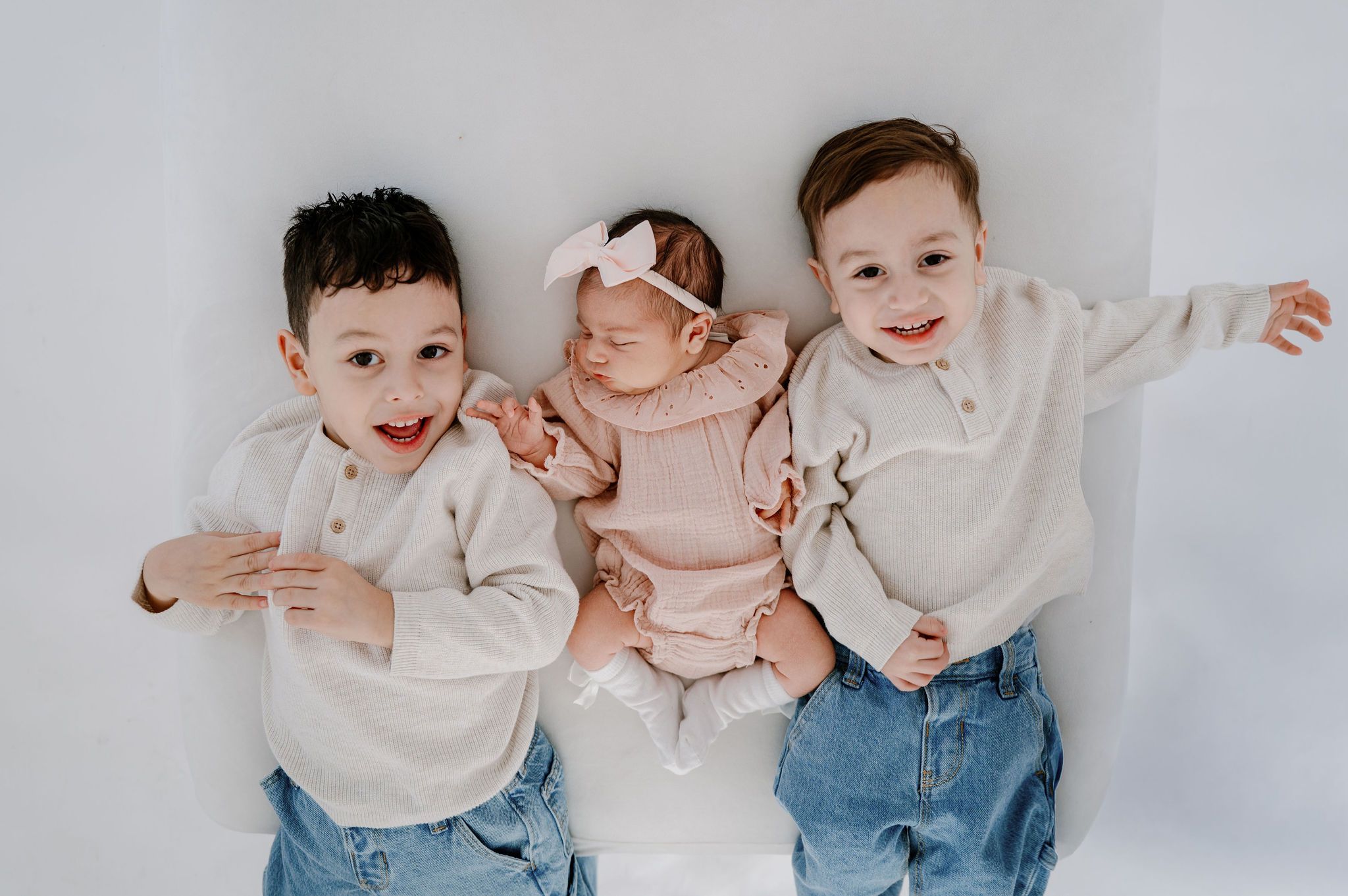Studio newborn photos at Casa Blanca, Tri-Cities | Baby girl, and two little brothers