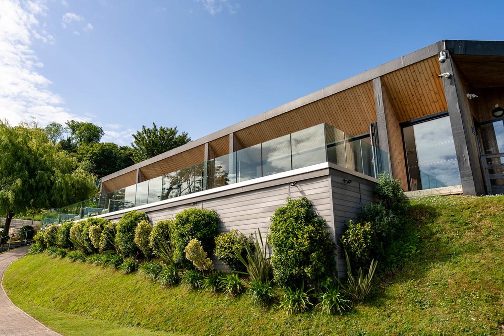 Beautiful outside view of the reception room at Sandy Cove Hotel Devon by Devon Wedding photographer