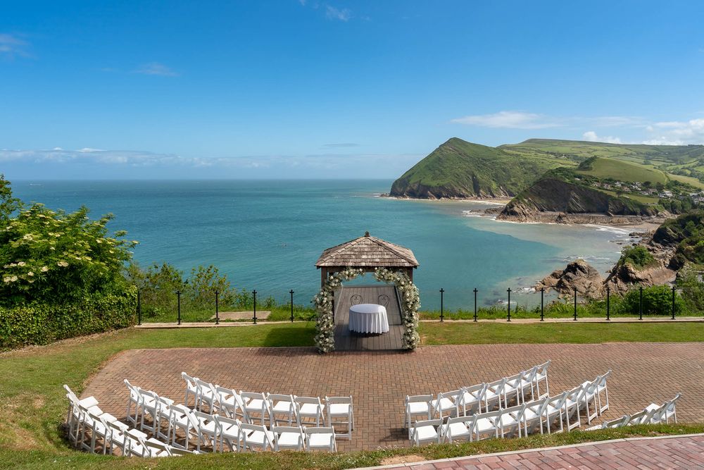 Stuuning outside ceremony set up overlooking the sea at Sandy Cove Hotel