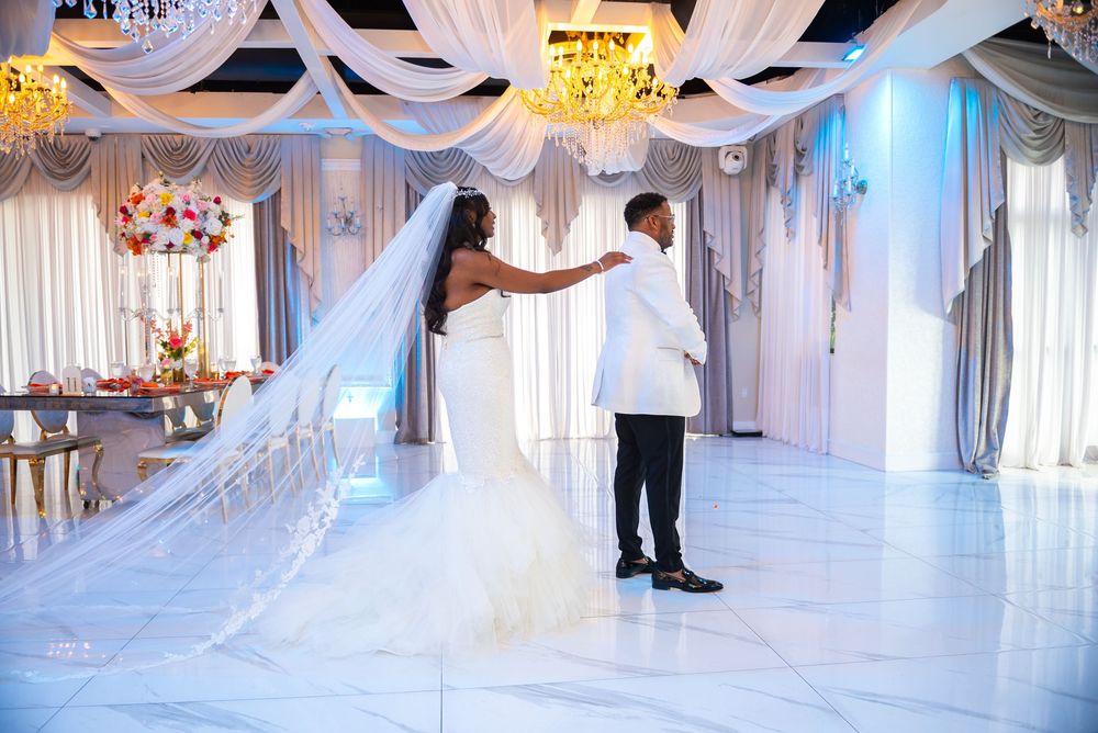 The soft touch from the bride on the groom.