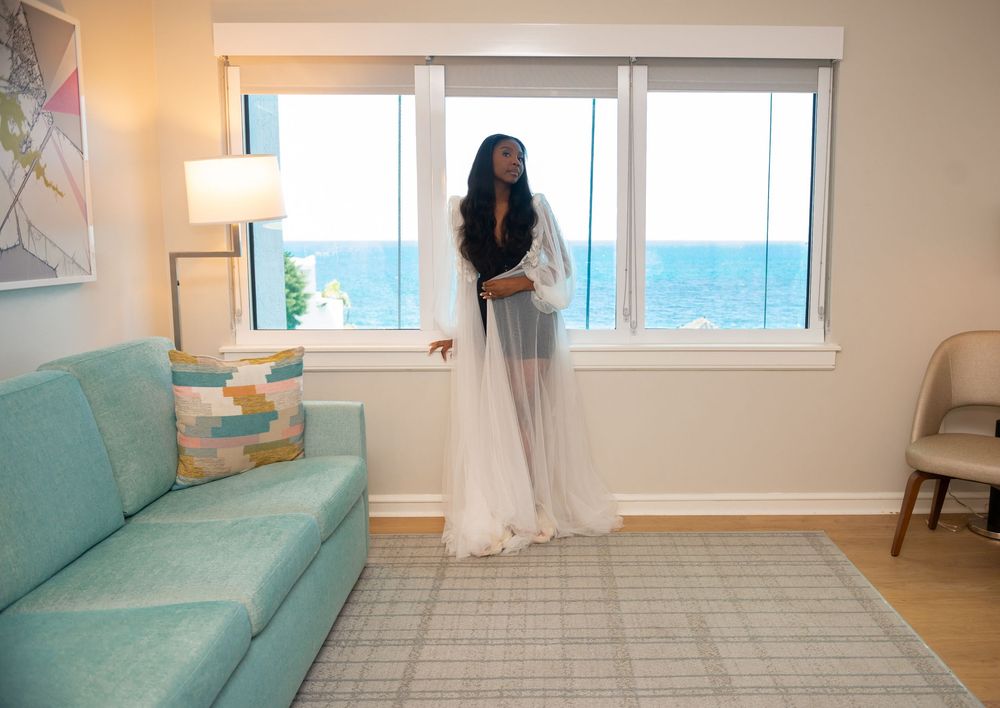Natural light from the bay window facing the beach.