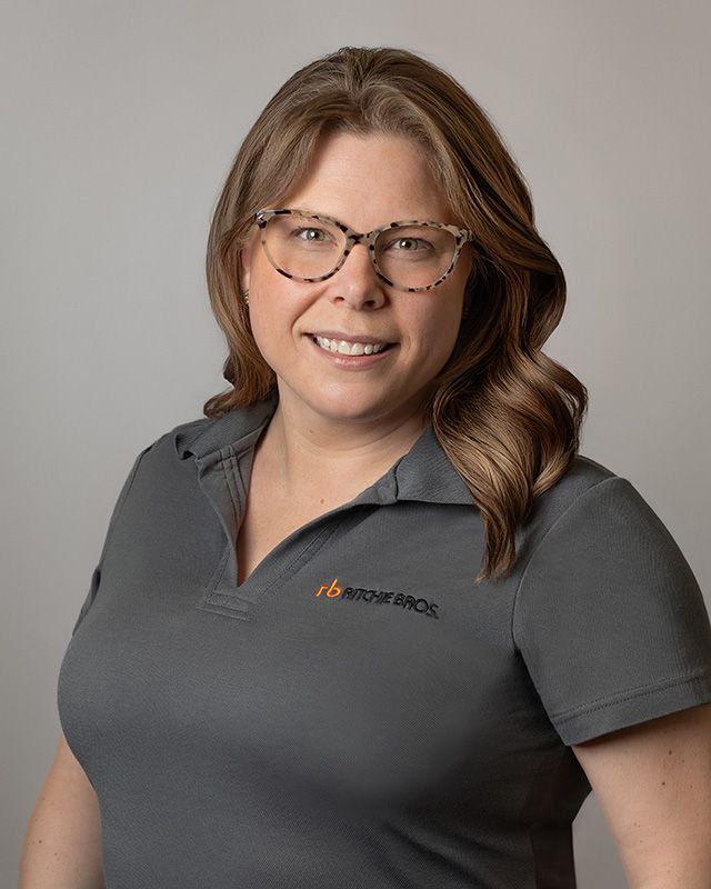 Professional sales team headshot at Ritchie Bros. Auctioneers, studio lighting setup