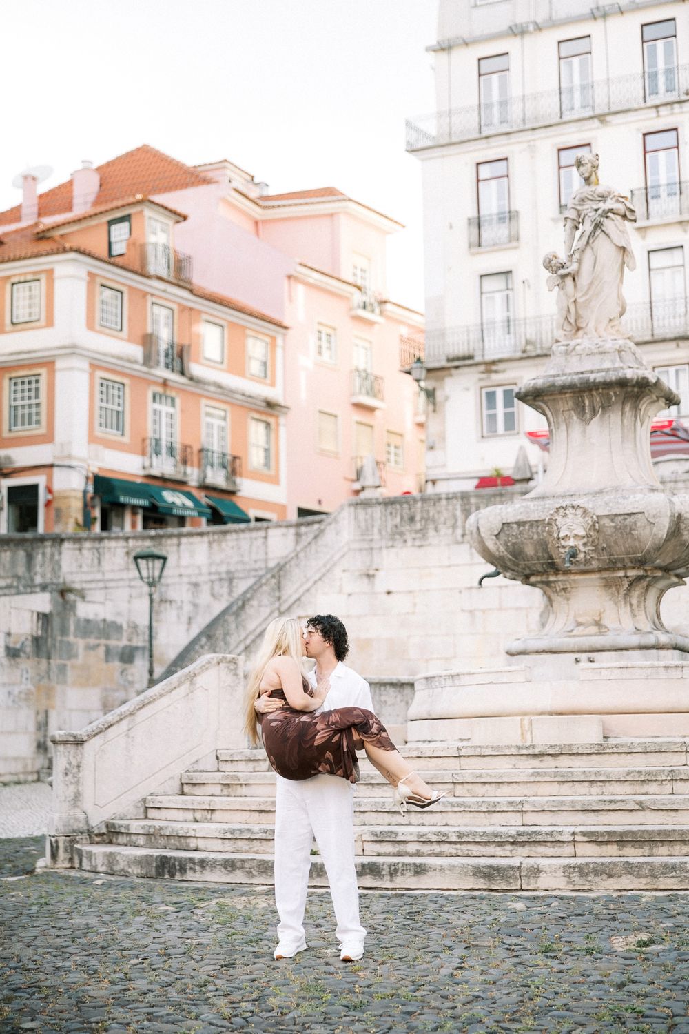 Intimate pre wedding session in Lisbon with soft golden evening light