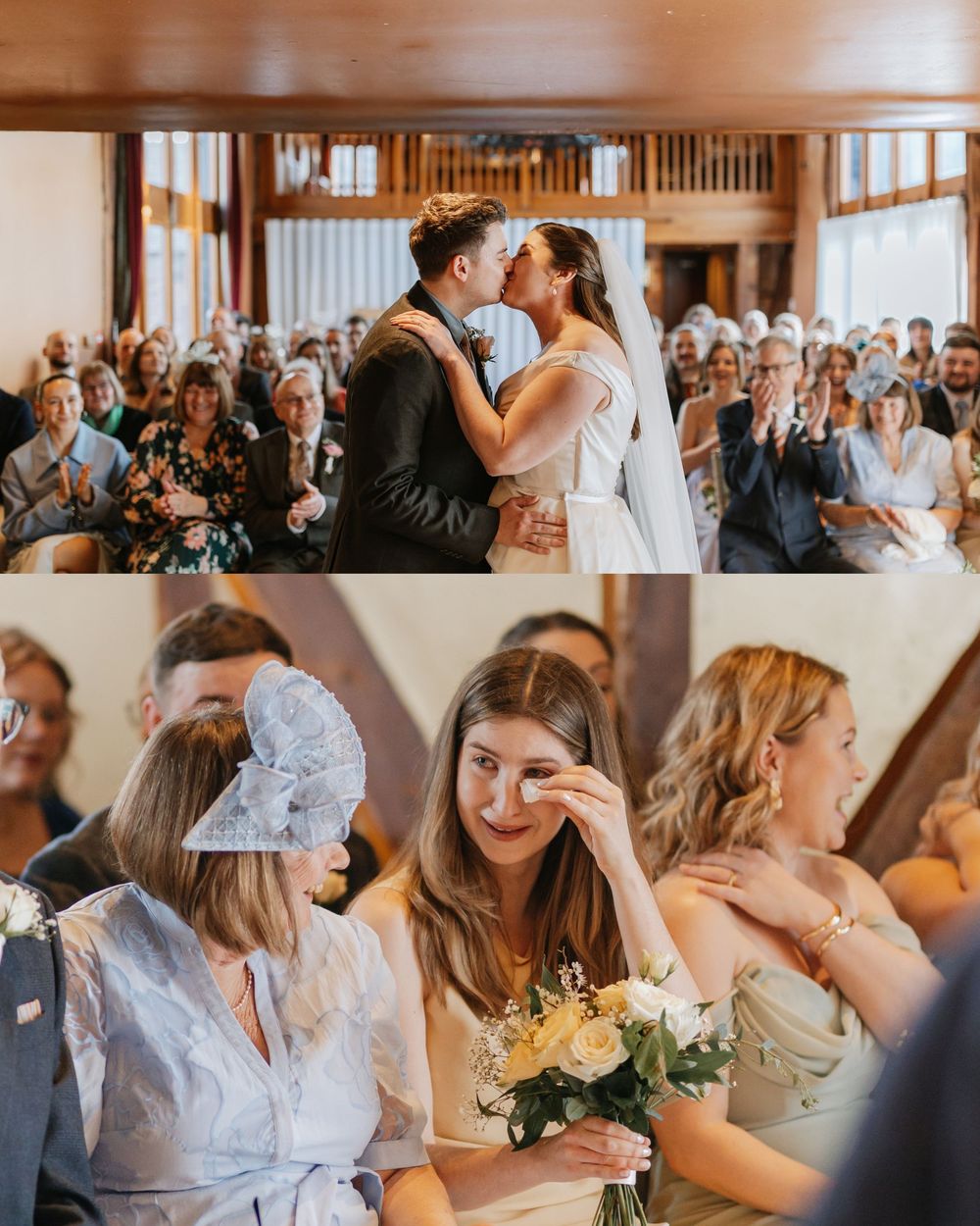Emotional wedding ceremony kiss at rustic venue with tearful guests celebrating in wooden hall.