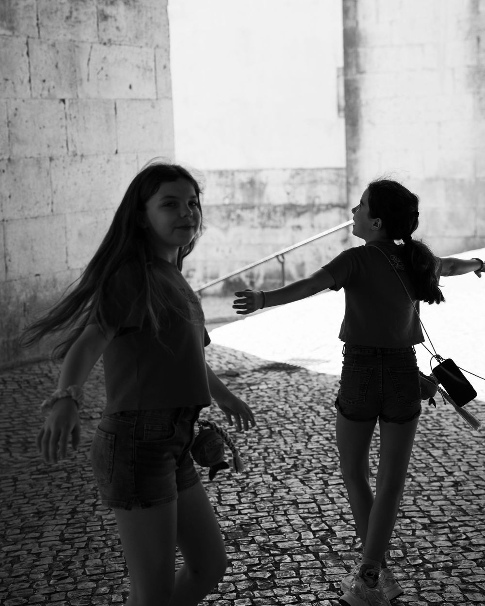 Two girls swirling around