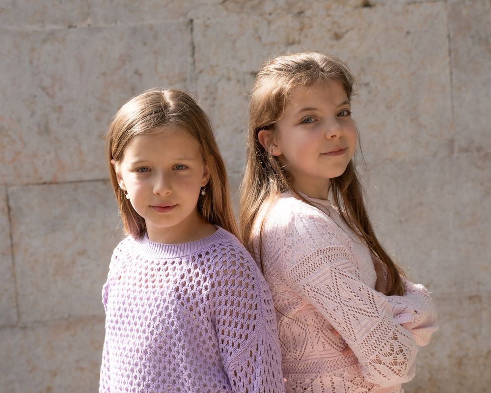 Two girls posing for a photo