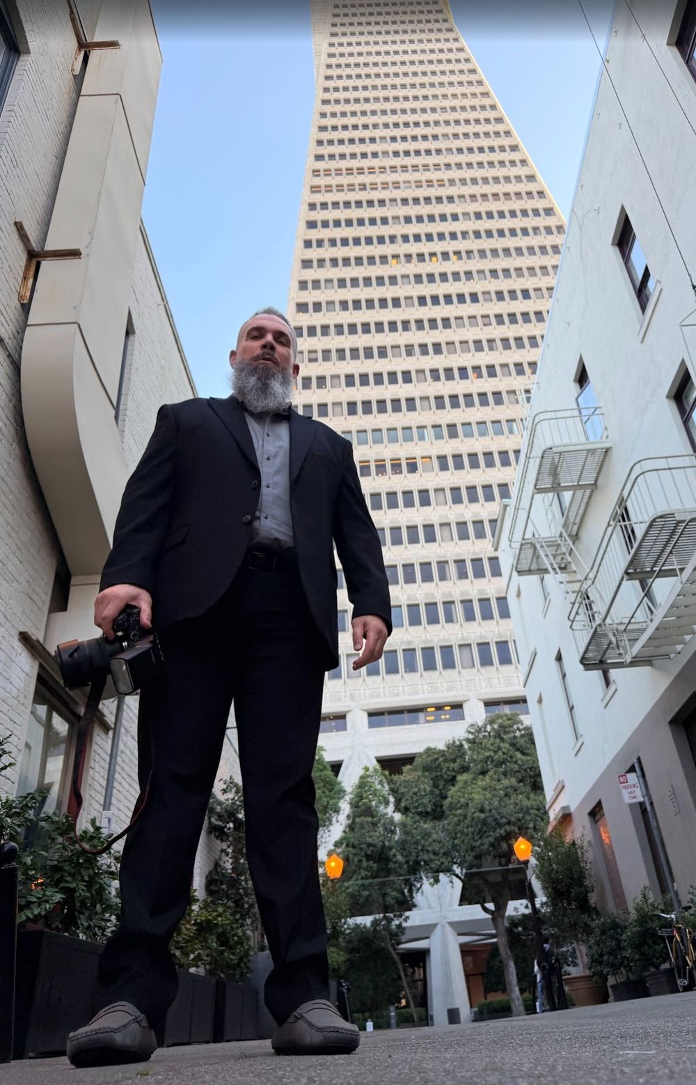 Portrait photographed near the Transamerica Pyramid in San Francisco by Raymond C. Hansell Photography.