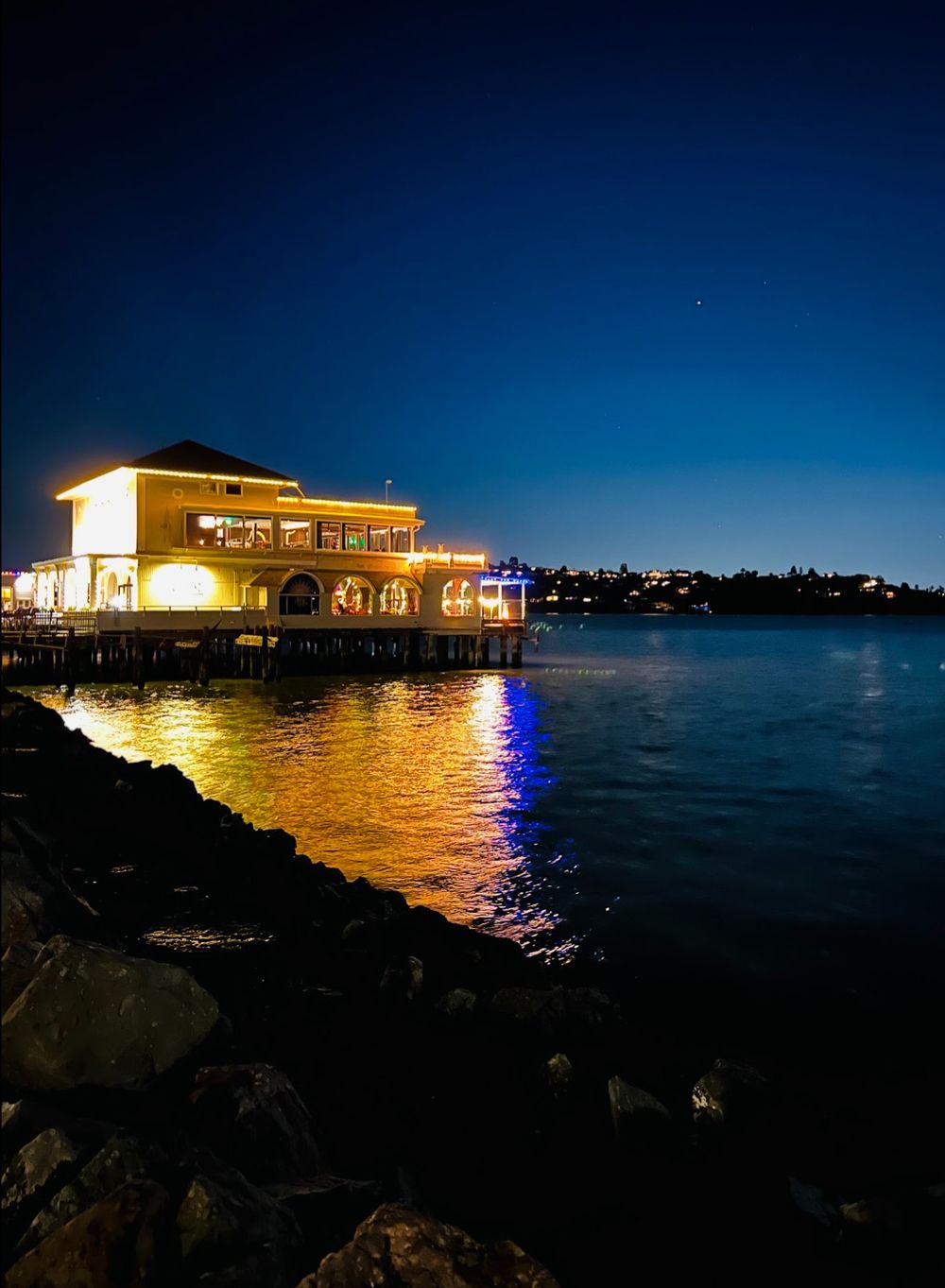Night waterfront photography captured in Sausalito by Raymond C. Hansell Photography.