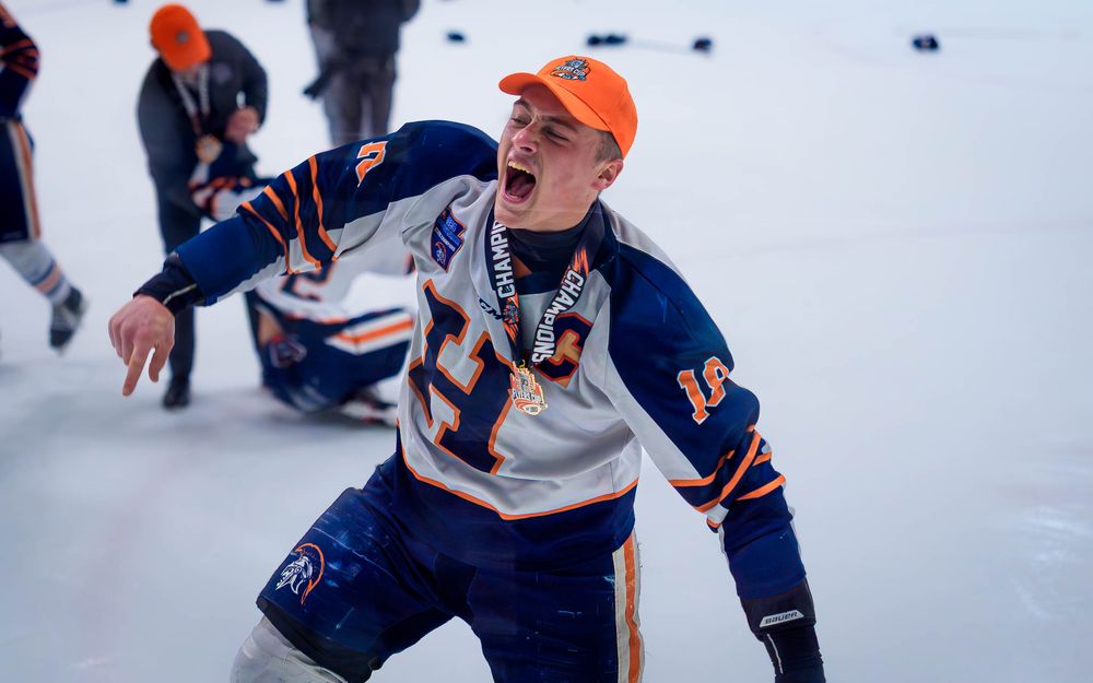 Hershey Trojan Blake Umberger celebrating the championship win by Deanna Fox, SportsFox Photography based in Hershey PA.