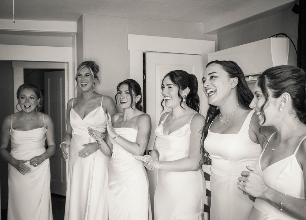Series of black and white photos showing wedding dress preparations in a bright indoor setting.