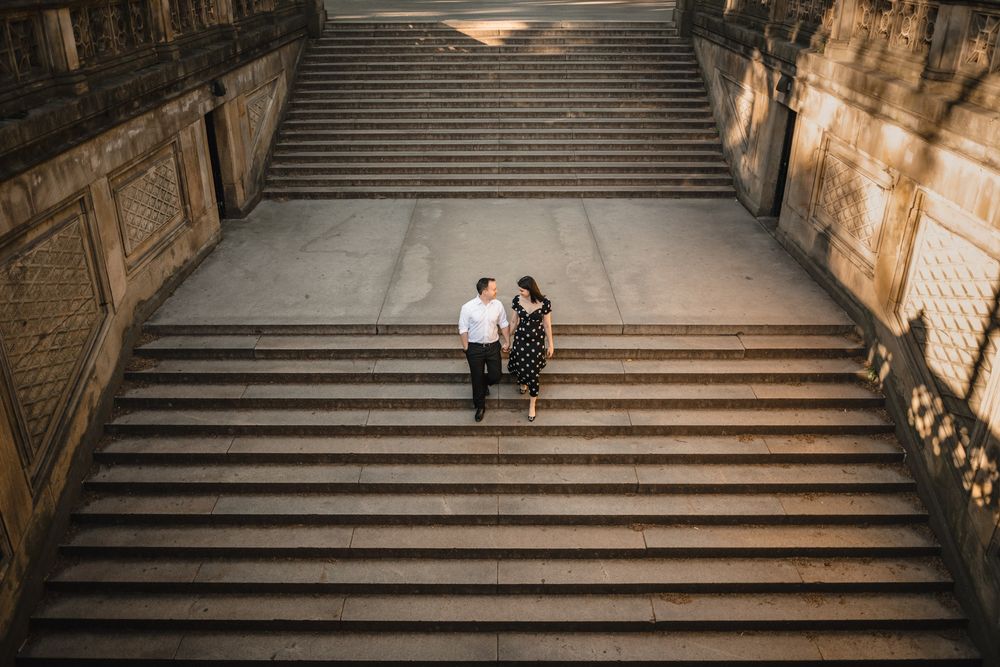 Wide angle view of grand stone steps with couple in the distance.