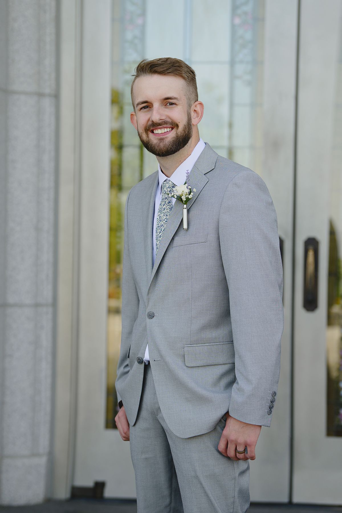Pocatello wedding photographer ShutterGirl  groom in front of Pocatello Idaho temple